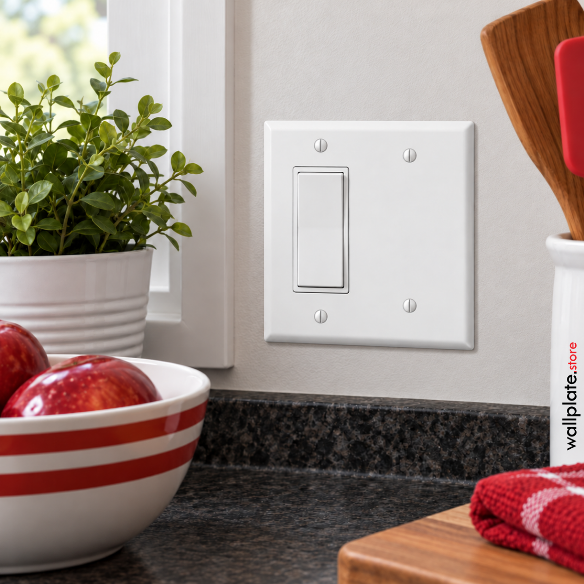 2 Gang white metal wall plate installed in kitchen above counter with one block opening and one blank.